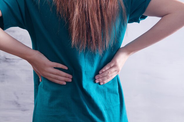 Young woman has kidney pain