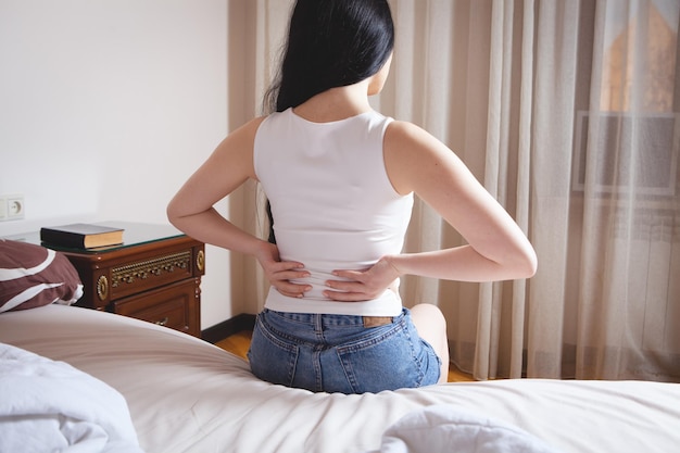 Young woman has kidney pain