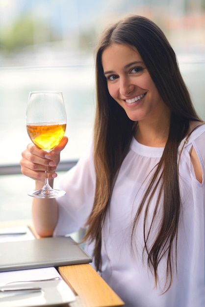 young woman have fresh healthy salad meal lunch at restaurant