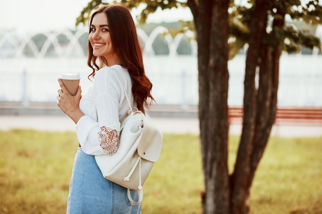 Young woman have good time in the park at her weekend