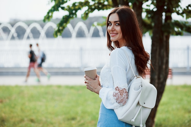 Young woman have good time in the park at her weekend