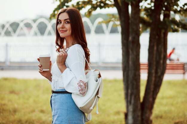 young woman have good time in the park at her weekend