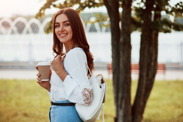 Young woman have good time in the park at her weekend