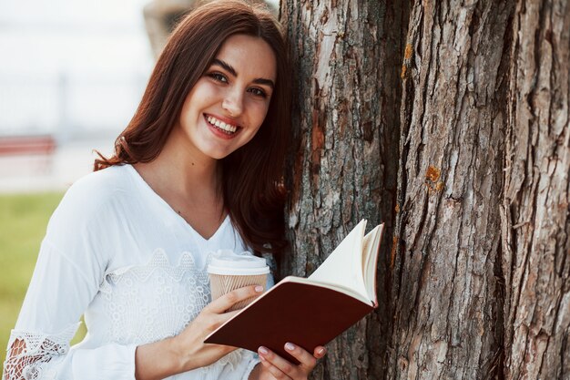 Young woman have good time in the park at her weekend