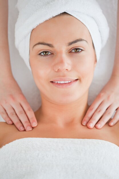 Young woman having a shoulder massage