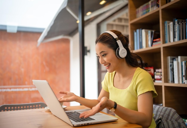 Young woman having video call via computer in the home officeBusiness video conferencing