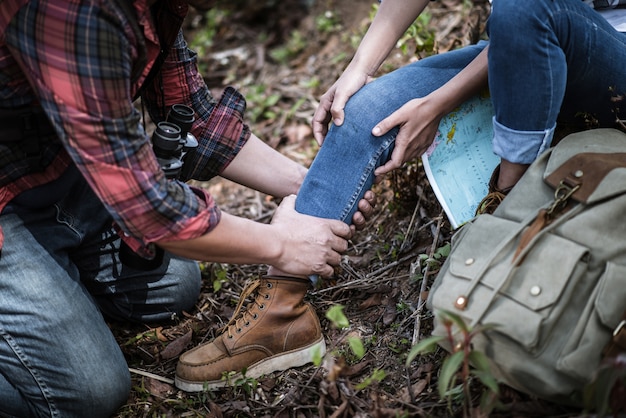 Young  woman hiking muscle pain.