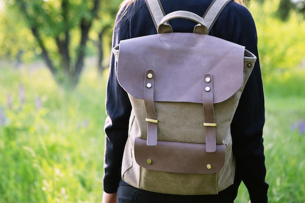 Young woman hiking with backpack