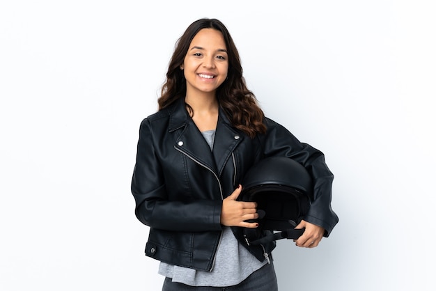 Young woman holding a motorcycle helmet isolated