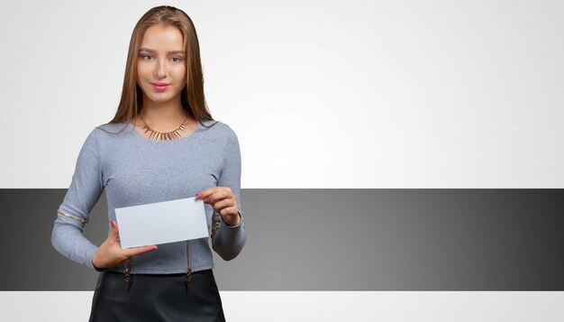 Young woman holding sign board