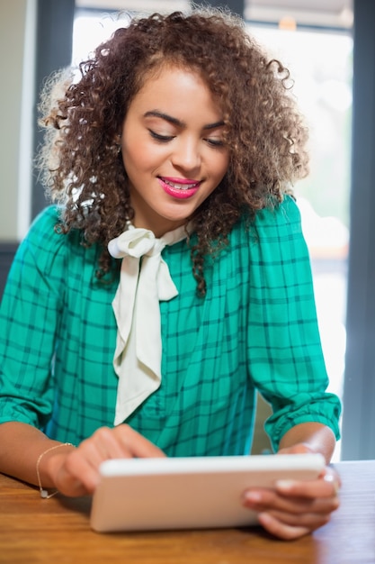 Young woman holding tablet pc