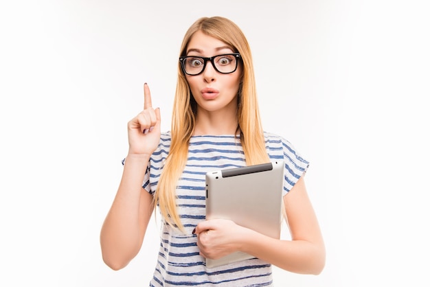 Young woman holding a tablet