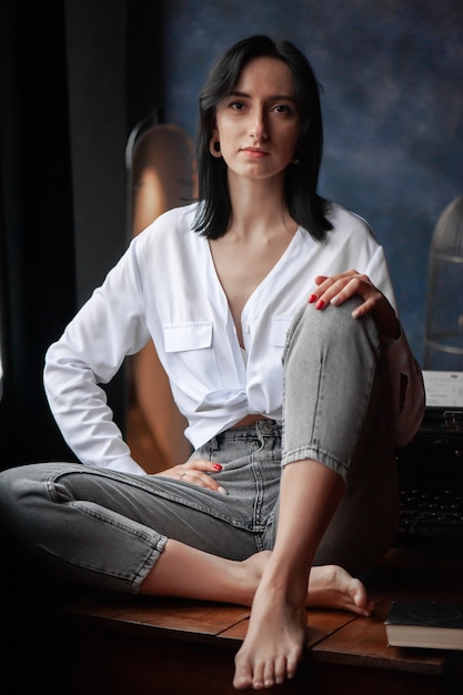 Young woman in a home atmosphere wearing casual clothes