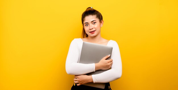 Young woman hugging laptop businesswoman hugging laptop love computer concept attractive female