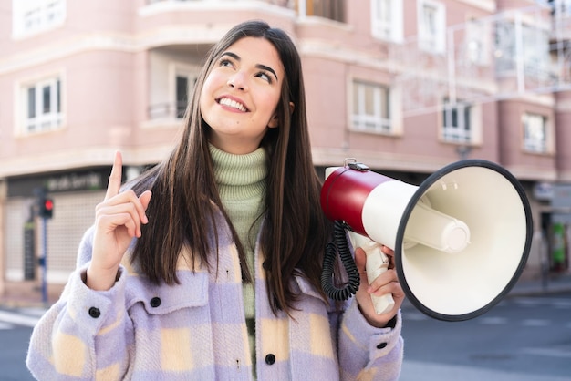 Young woman over  isolated background