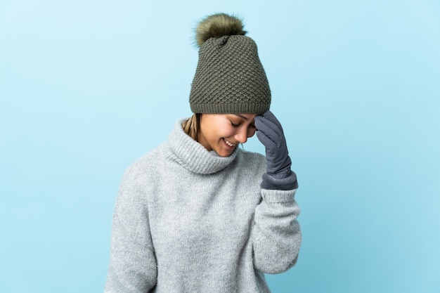 young woman over isolated wall