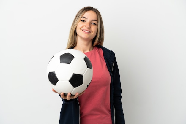 Young woman over isolated white background with soccer ball