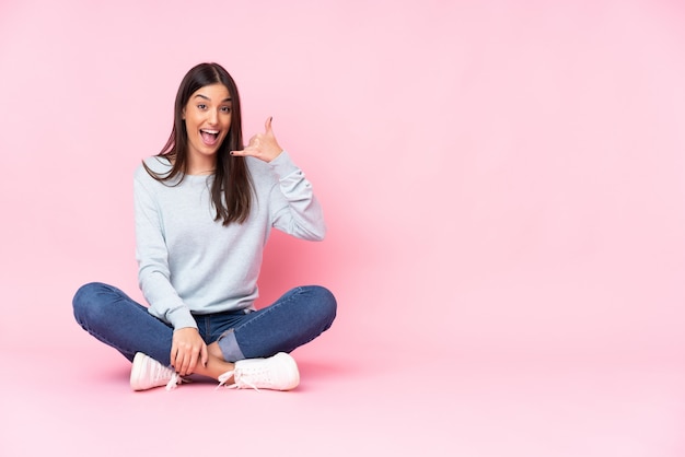 Young woman over isolated