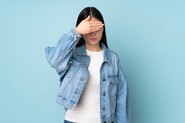 Young woman over isolated