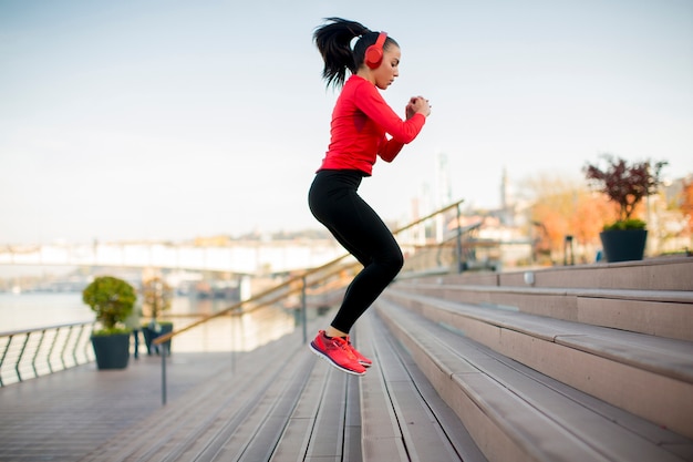 Young woman jumping outdoor