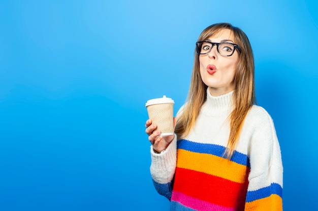 Young woman in a knitted sweater isolated