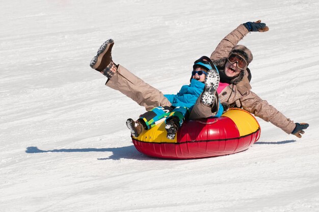 Young woman and little boy having fun