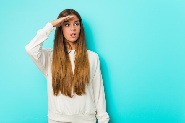 Young woman looking far away