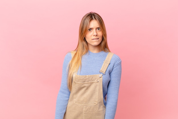 Young woman looking puzzled and confused