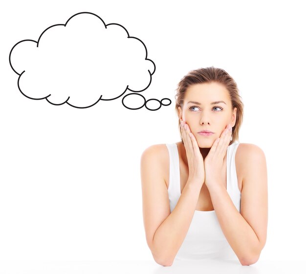 a young woman lost in thoughts over white background