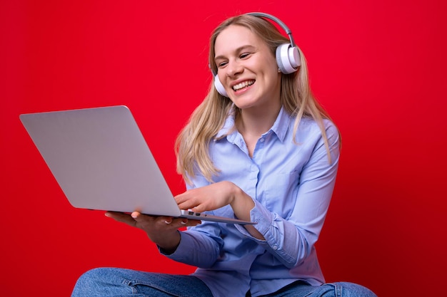 Young woman makes video call from laptop