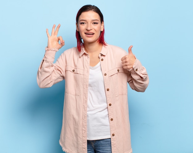 young woman making a gesture