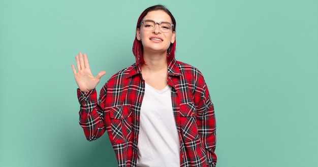 young woman making a gesture