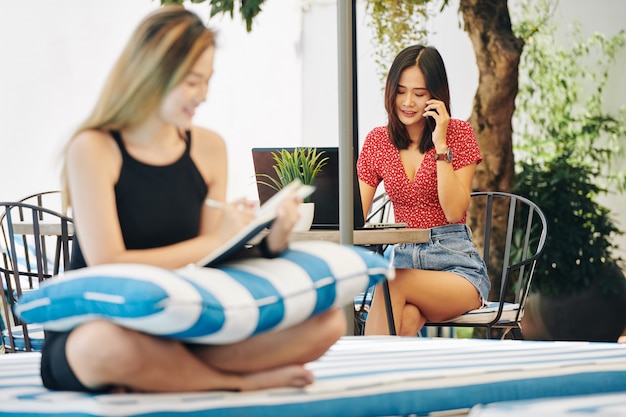 Young woman making phone call