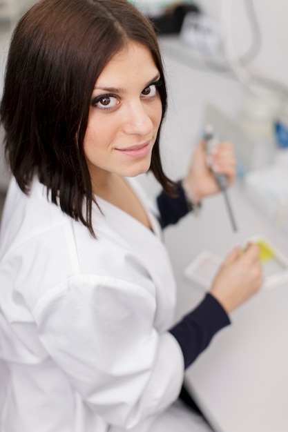 Young woman in the medical laboratory