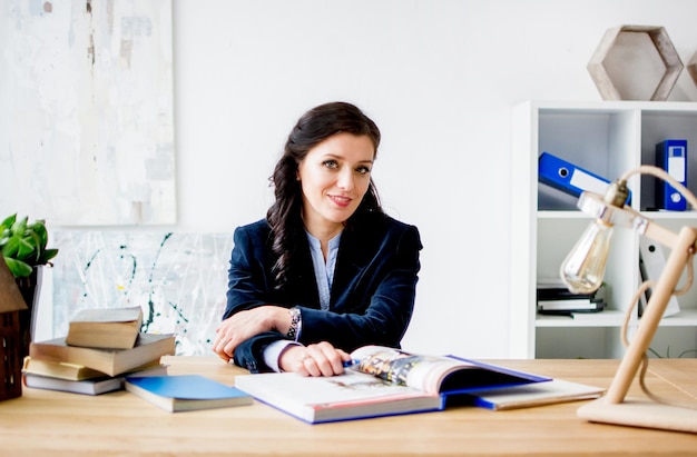 Young woman in the office A business woman is in an office building Woman at work