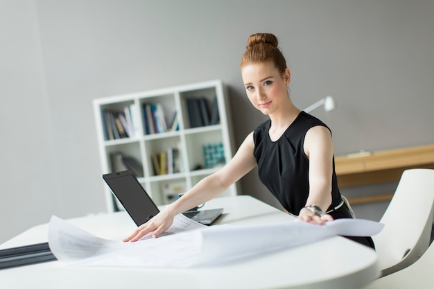 Young woman in the office