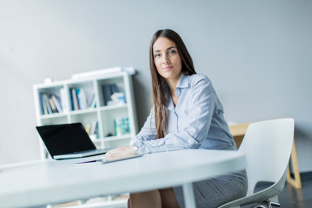 Young woman in the office