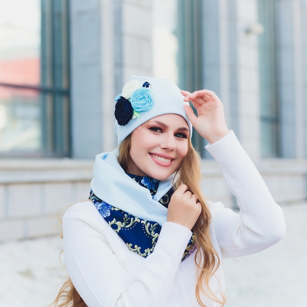 Young woman outdoor portrait with hat