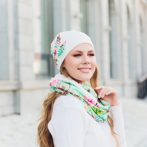 Young woman outdoor portrait with hat