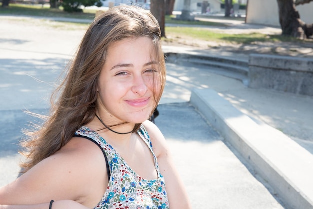 Young woman outdoors close-up portrait