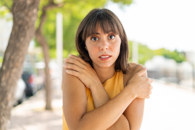 Young woman at outdoors freezing