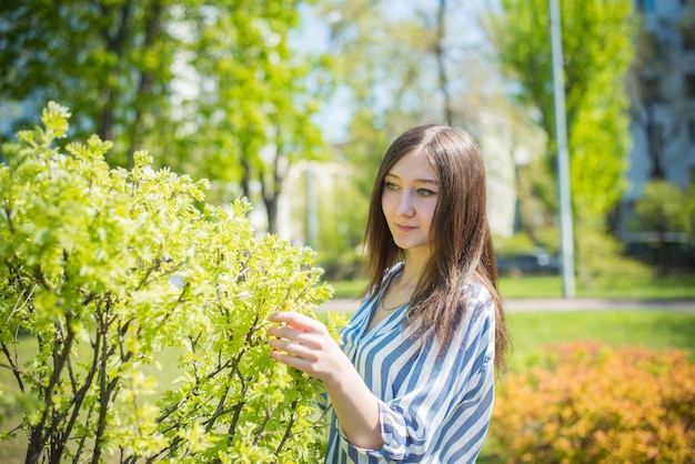 Young woman in the park in early spring