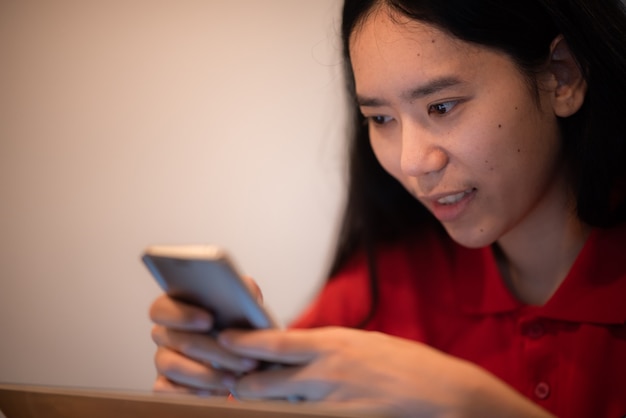 Young woman person using mobile phone to connecting with cyberspace communication, holding smartphone and texting message, female people happy with smart technology, girl lifestyle for business online