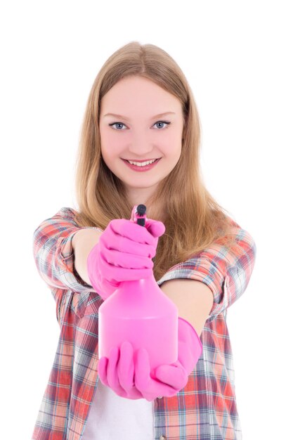 Young woman in pink gloves with spray over white