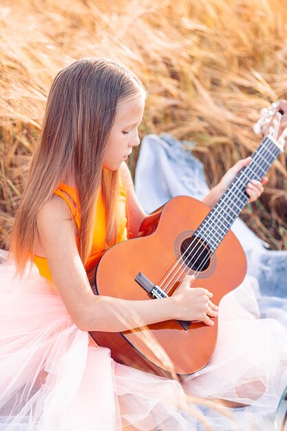 Young woman playing guitar