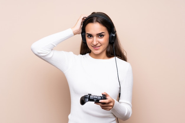 Young woman playing at videogames