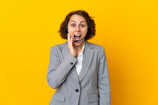 Young woman posing isolated against the blank wall