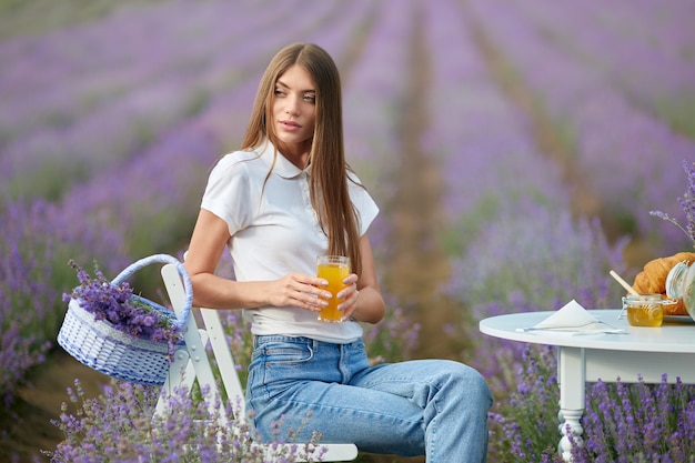 Young woman posing in lavender field