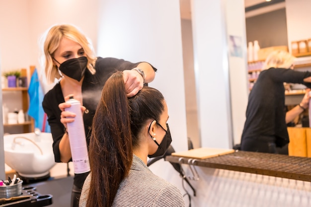 A young woman posing in the make up studio