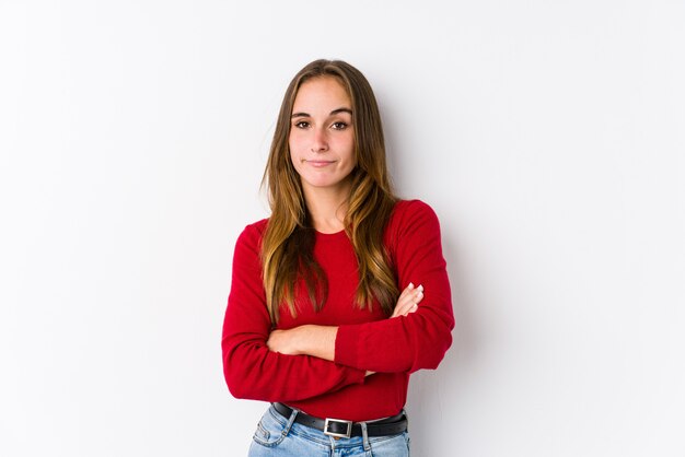 Young woman posing  unhappy with sarcastic expression